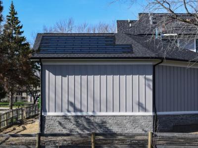 DOW Powerhouse Solar Shingles Installed Above Garage 