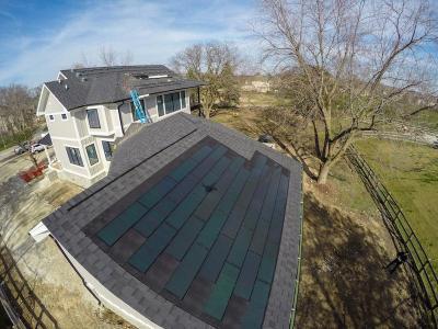 DOW Powerhouse Solar Shingles Installed Above Garage On Modern Farm House Eco-Smart Home 